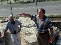 Father Bob and Karl at site of prison