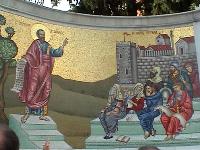 Mosaic representation of Paul preaching to the people of the city.